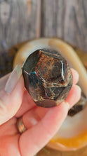 Load and play video in Gallery viewer, Polished Faceted Garnet
